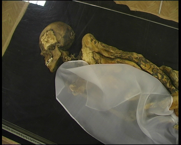This is a mummy of young woman, 20-25 years old with blond hair, 